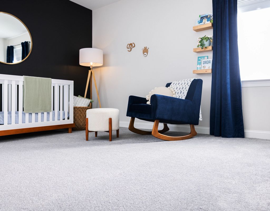 Blue chair on white carpet | Fantastic Floors