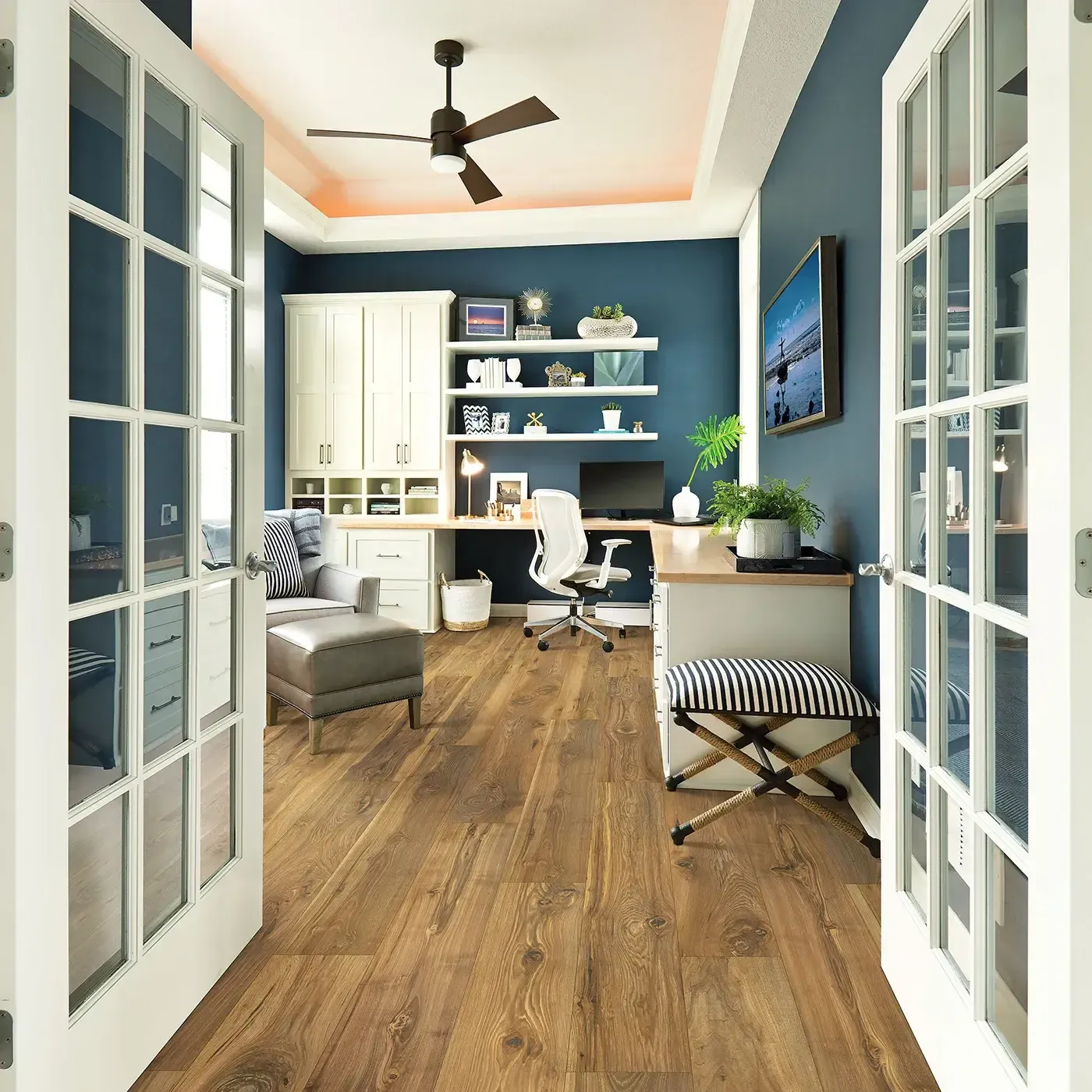 Laminate in a medium brown wood tone in a home office | Fantastic Floors