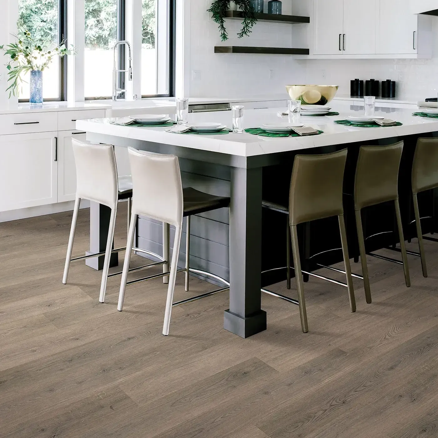 Mohawk Laminate in a gray-brown wood tone in a modern kitchen | Fantastic Floors