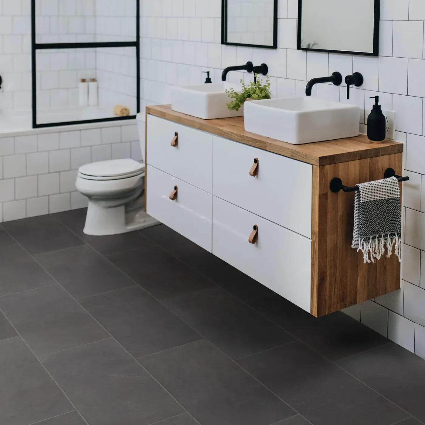 Shaw Floors Ember dark gray rectangular tile in a modern bathroom | Fantastic Floors