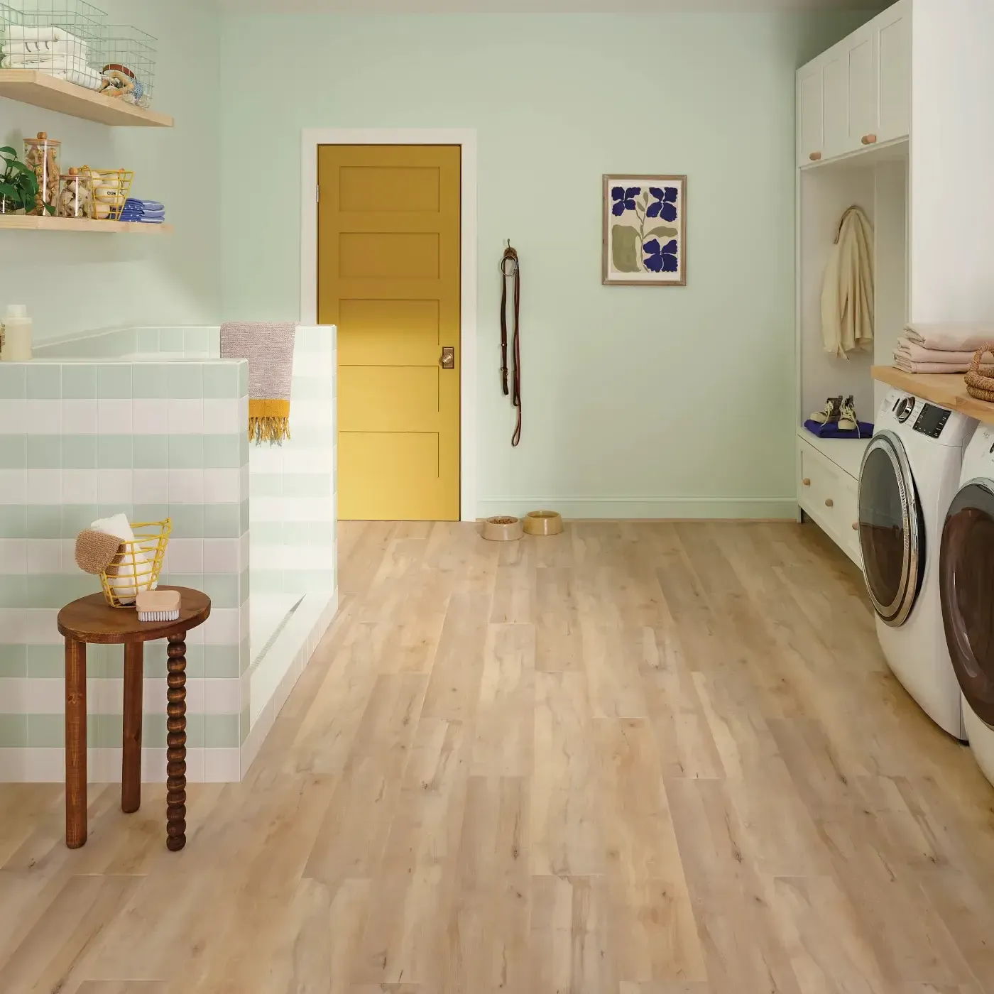 COREtec Luxury Vinyl in a light blonde wood color in a laundry room | Fantastic Floors